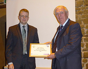 Peter Burns collecting the runners up certificate.